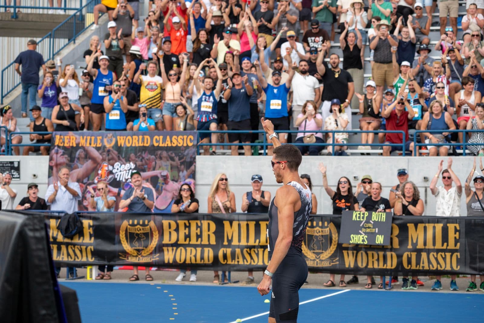 A crowd celebrating at the Beer Mile World Classic